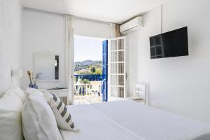 TV a/nebo společenská místnost v ubytování Aperitton Hotel