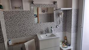 Koupelna v ubytování OLEANDRI SUITE B&B