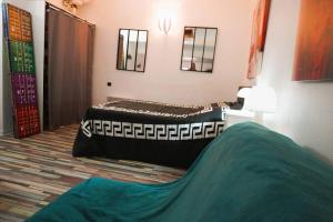 a room with two beds in a room at l'Azur 4 Pers Clim Parking Accès plage direct in Le Barcarès