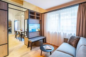 TV a/nebo společenská místnost v ubytování SWISSPEAK Resorts Thyon 4 Vallées