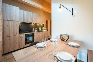 Kuchyň nebo kuchyňský kout v ubytování SWISSPEAK Resorts Thyon 4 Vallées