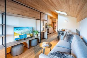 TV a/nebo společenská místnost v ubytování SWISSPEAK Resorts Thyon 4 Vallées