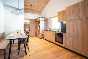Kuchyň nebo kuchyňský kout v ubytování SWISSPEAK Resorts Thyon 4 Vallées
