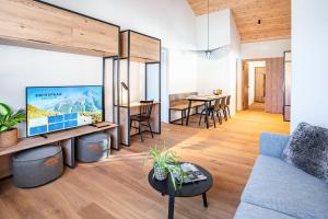 TV a/nebo společenská místnost v ubytování SWISSPEAK Resorts Thyon 4 Vallées