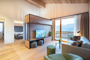 TV a/nebo společenská místnost v ubytování SWISSPEAK Resorts Thyon 4 Vallées