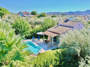 an aerial view of a villa with a swimming pool at Beach Villa Fotini with private pool by DadoVillas in Lefkada Town