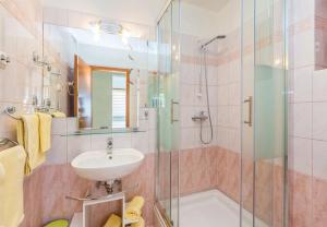 Kúpeľňa v ubytovaní Apartments Ivni