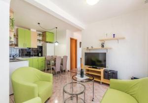Kuchyňa alebo kuchynka v ubytovaní Apartments Ivni