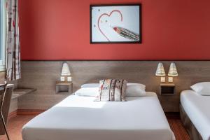 Postel nebo postele na pokoji v ubytování Ace Hotel Annemasse Genève