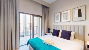 Ένα ή περισσότερα κρεβάτια σε δωμάτιο στο Mag Eye - Spacious Two Bedroom Townhouse