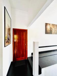 Rúm í herbergi á Mali Guest House