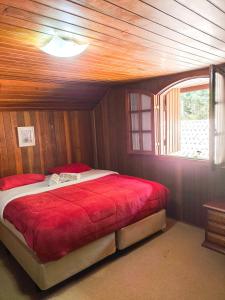 Postel nebo postele na pokoji v ubytování La Casa da Fotografia