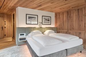 Postel nebo postele na pokoji v ubytování Hotel Auriga
