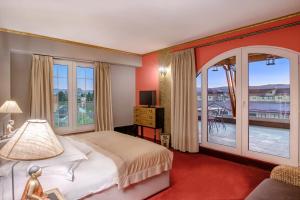 Postel nebo postele na pokoji v ubytování Simfonia Boutique Hotel