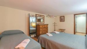 Un ou plusieurs lits dans un hébergement de l'établissement La Cabaña La Carlota by Ruralidays 28 autres photos