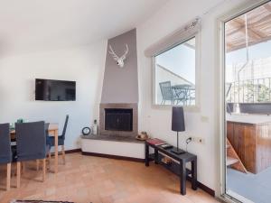 A television and/or entertainment centre at Navona penthouse