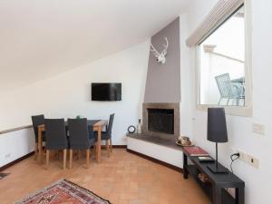 A television and/or entertainment centre at Navona penthouse