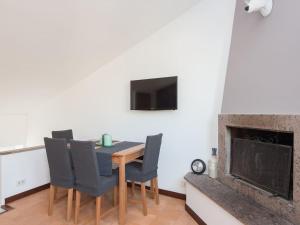 A television and/or entertainment centre at Navona penthouse
