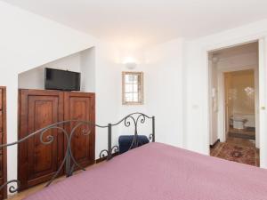 A television and/or entertainment centre at Navona penthouse