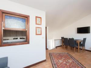 A television and/or entertainment centre at Navona penthouse