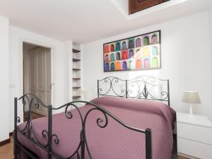 A bed or beds in a room at Navona penthouse