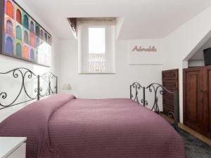 A bed or beds in a room at Navona penthouse