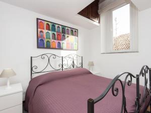 A bed or beds in a room at Navona penthouse