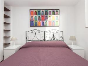 A bed or beds in a room at Navona penthouse