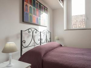 A bed or beds in a room at Navona penthouse