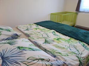 Postel nebo postele na pokoji v ubytování Chalupa Výtoň