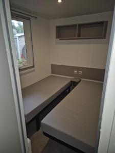 Postel nebo postele na pokoji v ubytování bonne anse plage camping siblu