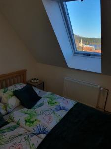 Postel nebo postele na pokoji v ubytování Chalupa Výtoň