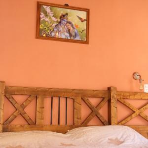 Postel nebo postele na pokoji v ubytování Hostal SPA Casa de Piedra