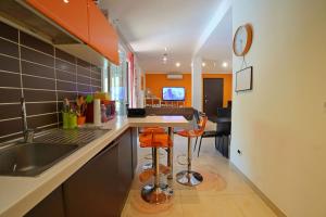 Kuchyň nebo kuchyňský kout v ubytování La Sevillana