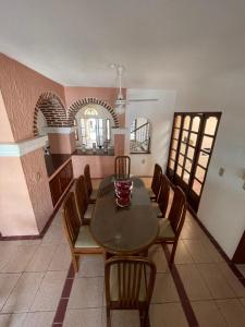 a dining room with a table and chairs and a mirror at Casa Don Pedro in Apozol +24 photos