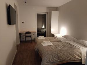 Postel nebo postele na pokoji v ubytování Casa Tua