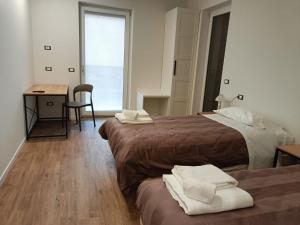 Postel nebo postele na pokoji v ubytování Casa Tua