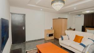 Posezení v ubytování The Luxe Apartment