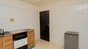 Kuchyň nebo kuchyňský kout v ubytování The Luxe Apartment