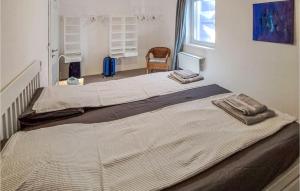 2 Bedroom Gorgeous Apartment In Olib客房内的一张或多张床位
