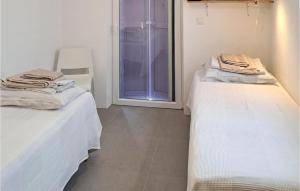 2 Bedroom Gorgeous Apartment In Olib客房内的一张或多张床位