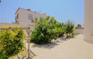 a view from the balcony of a house with trees at Cozy Home In El Chaparral in La Mata +14 photos