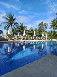 Bazén v ubytování Apartamento de Lujo en Playa Jacó, Frente al Mar, Wifi, AC, Parqueo Privado y Piscinas nebo v jeho okolí