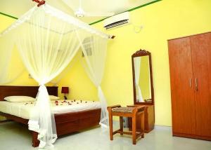 Giường trong phòng chung tại Feelsidevilla +17 ảnh