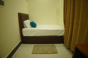 Postel nebo postele na pokoji v ubytování secret paradise sylhet