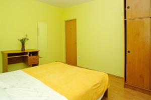 Posteľ alebo postele v izbe v ubytovaní Apartments Penović