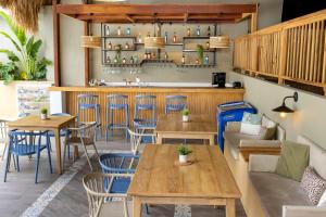 Χώρος καθιστικού στο Hotel Sansiraka Suites By GEH Suites