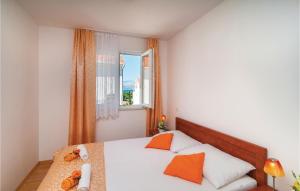 Ένα ή περισσότερα κρεβάτια σε δωμάτιο στο Apartment Supetar 44