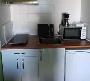 Kuchyň nebo kuchyňský kout v ubytování Casas Rurales Manolo