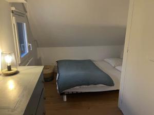 Rúm í herbergi á Gîte Traou Nod